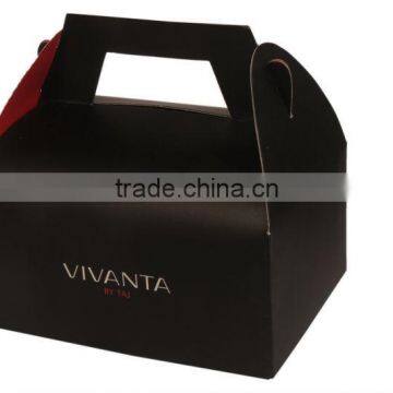 Cake box with die cut handle