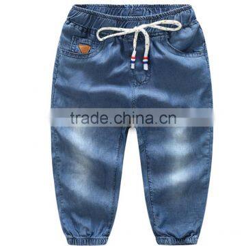 Jeans Supplier in China Low Price 100% Lyocell Kids Jeans Wear With Elastic Leg Opening photo-2