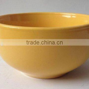 yellow colored stoneware small bowl