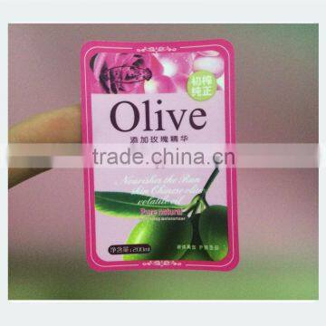 Adhesive label for olive oil bottle