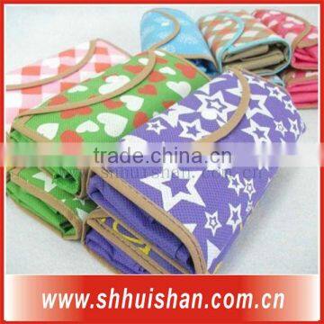 Fold into small bag of non woven bag