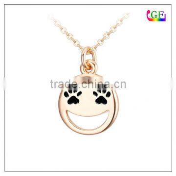 Gold tone smiley face coin pendant necklace