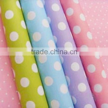 Multicolored Mini Dots Reversible Wrapping Paper