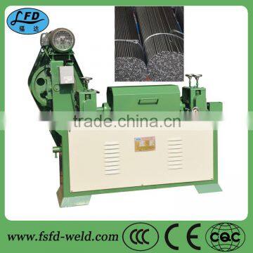 Automatic rebar straightening and cutting machine