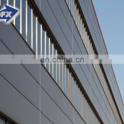 Qingdao low cost turn key contracting prefabricated steel frame building warehouse