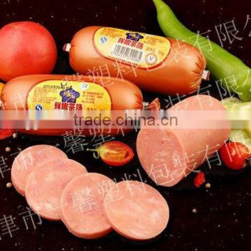 Multilayer compound co-extruded casing for sausage