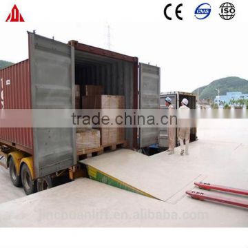 Stationary hydraulic dock leveller truck loading ramp for warehouse