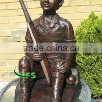 Bronze sculpture of playing baseball sportsman