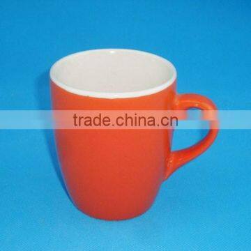 Customized belly shaped porcelain orange color glazed mugs