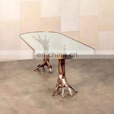 Burnished bronze trim tempered glass racetrack-shaped top high-end table