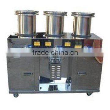 Automatic herb decocting and packaging machine