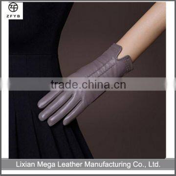 lady hand driving touch screen leather gloves