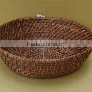 Round bamboo/rattan basket in brown