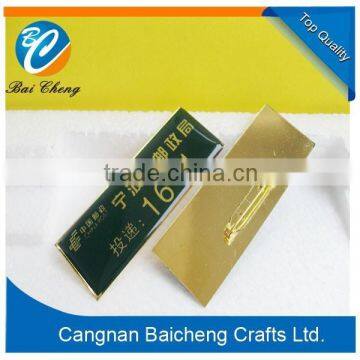 Gold plating enamel color name badge with safety pin welcome hotel and company logo engraved cost reasonable