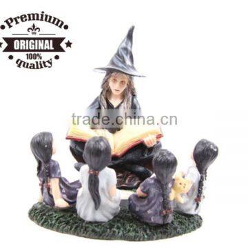 resin witch and children painted tealight holder