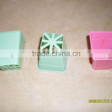 mini flowerpots of plastic