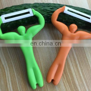 High quality ceramics head strong man design plastic fruit peeler for kid safe using