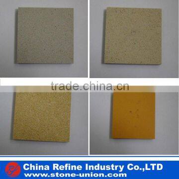 Yellow man-made stone tile