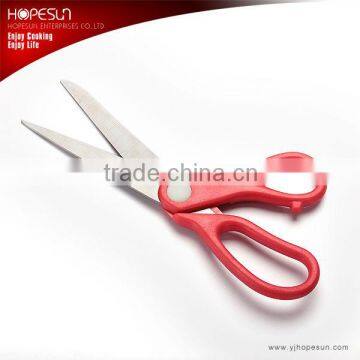 Red color plastic handle scissors