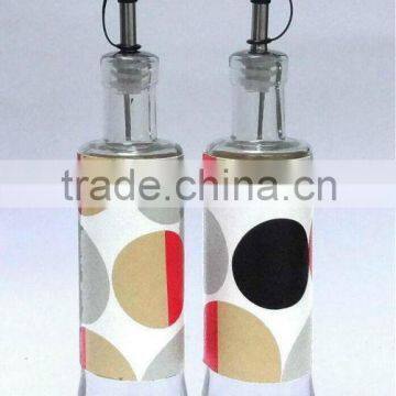 TW675P7 round glass oil bottle with leather coating