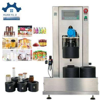 fully automatic double - station vacuum capping machine, model hy - xg2, integrated machine for air extraction and sealing of hawthorn canned glass bottles