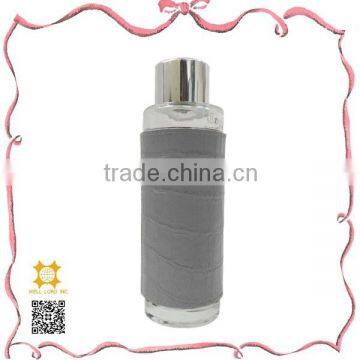 Low profile luxury gray leather fragrance atomizer bottle