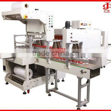 Automatic beverage bottle film sealing and shrinking machine