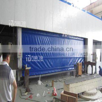 Industrial wind resistant automatic fold up garage door