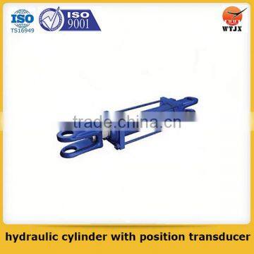 Quality assured piston type hydraulic cylinder with position transducer