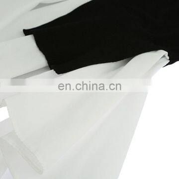 TWOTWINSTYLE Patchwork Women's Sweater Long Sleeve Hit Colors Irregular Long Knitting Pullover photo-4