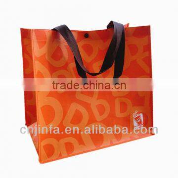 The orange color laminated non woven bag