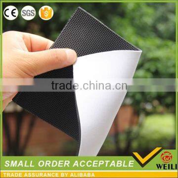 Embossed neoprene sheet with nylon fabric