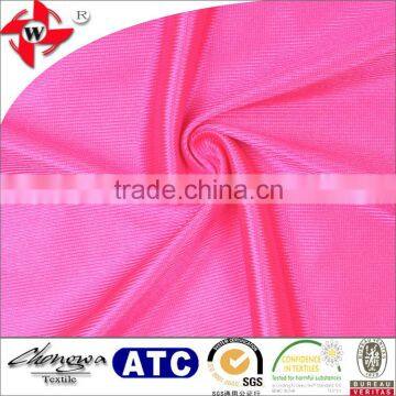 smooth dazzle polyester tricot warp knitted fabric for garments