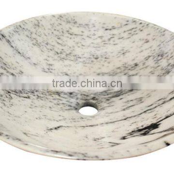 white marble wash basin