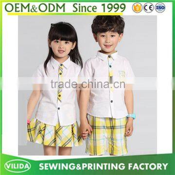 Hot Selling Kindergarten Uniform New Fashion Primary School Uniform White Shirt and Yellow Checked Shorts or Skirt photo-2
