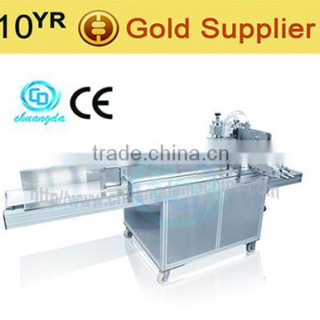 J: Facial tissue packing machine, draw type facial tissue folding packing machine