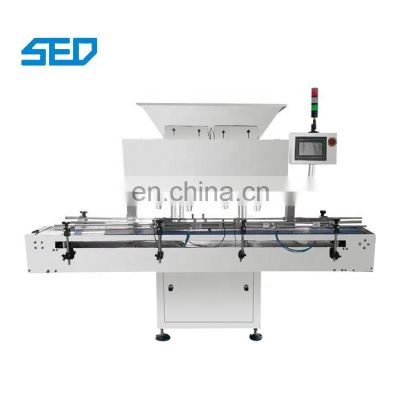 Electronic Pharmaceutical 32 Channel Automatic Candy Tablet Capsule Counting And Bottling Machine For Sale