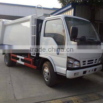 white color 4*2 compactor garbage truck