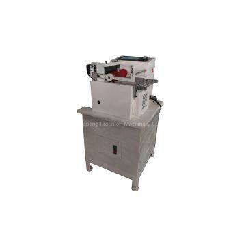 Belt cutting machine for yarn tape