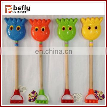 4 kinds mixed plastic sand digger toy with wood handle