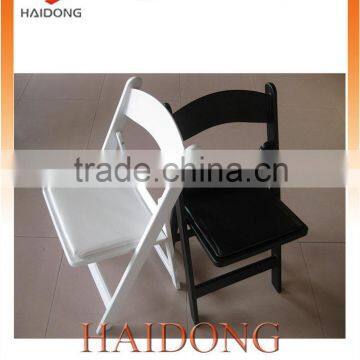 Space saving White and black Resin Folding Chair