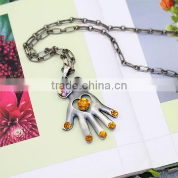 Inlaid Orange Rhinestone Gloves Designed Plated Silver Necklace KSLN0010