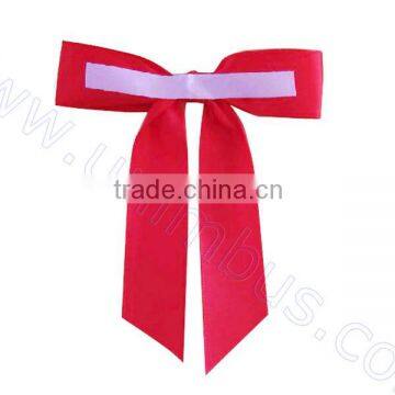 pre tied satin bow used in glued onto the top of gift box