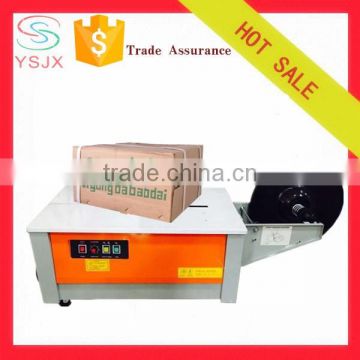 Semi-Automatic carton tying strapping machine/packing machine for carton box