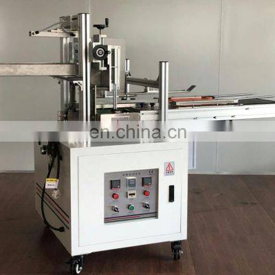Low Price Semi Automatic Facial Tissue Carton Box Packing Machine photo-3
