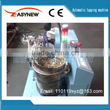 Automatic nut tapping machine