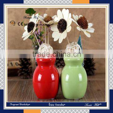 coloured flower and ceramic bottle reed diffuser with glass oil natural sticks