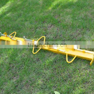 Heavy duty steel construction post strainer for wire fencing