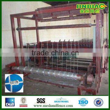 Knotted wire mesh fence