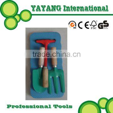 Kneeler with Children garden tools